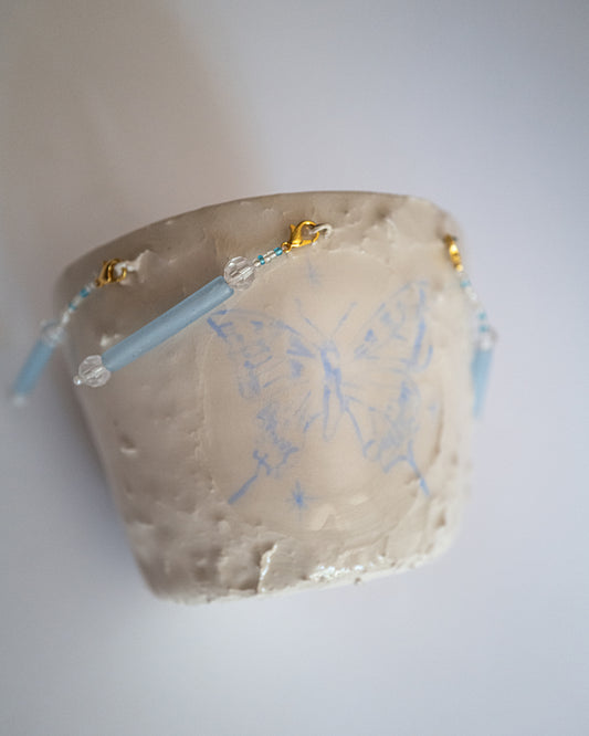 Pot papillon.