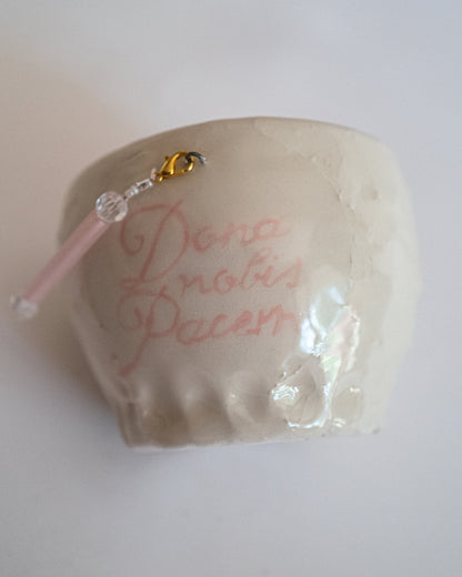 Pot "Dona nobis pacem".