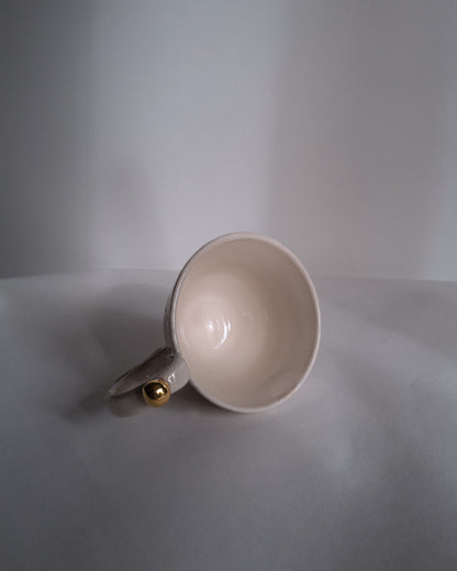 Tasse 11.