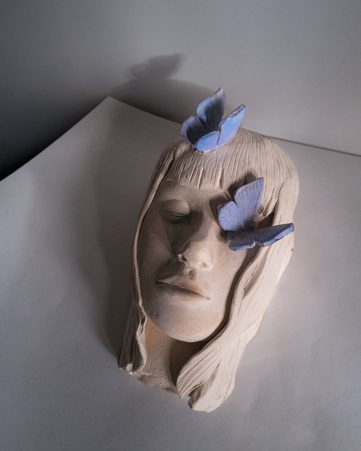 Sculpture "visage en paix”.