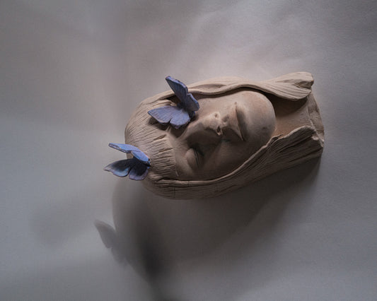 Sculpture "visage en paix”.