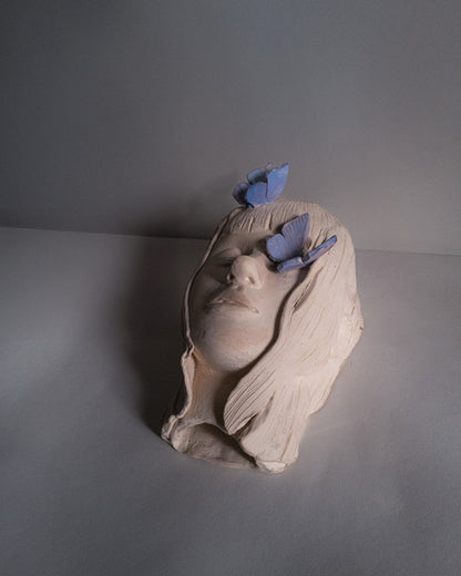 Sculpture "visage en paix”.