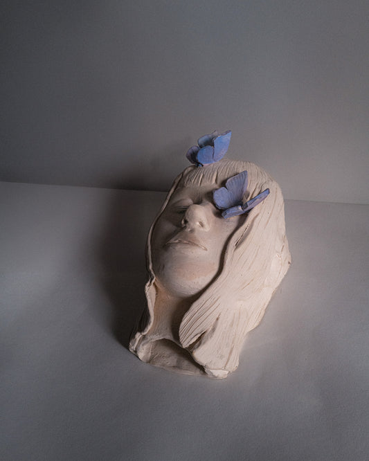 Sculpture "visage en paix”.