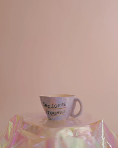 Tasse "she loves flowers".